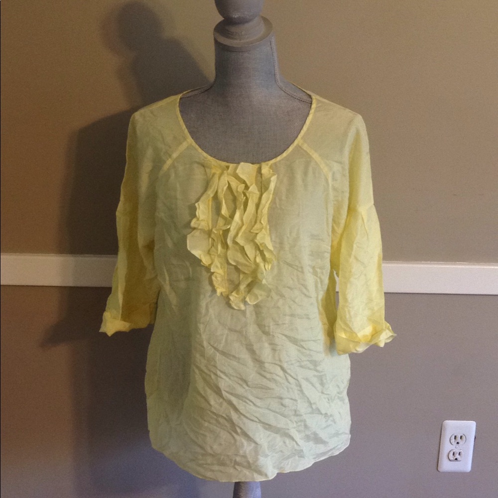 light yellow with ruffles top!